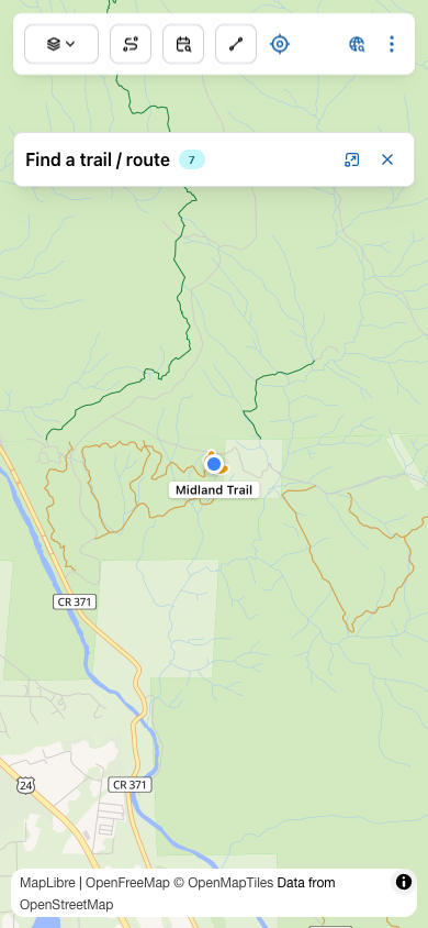After tapping Show on map: the trail is highlighted in green and a labeled pin marks Midland Trail. The panel collapsed to a thin header at the top.